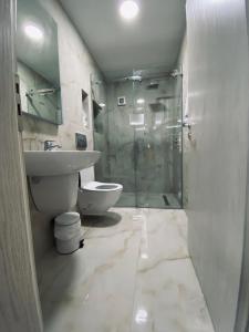Koupelna v ubytování Hotel Piemonte