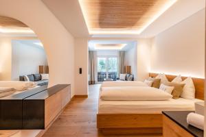 Krevet ili kreveti u jedinici u okviru objekta Spa&Aktiv Hotel Lavendel