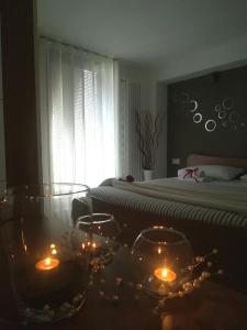 Łóżko lub łóżka w pokoju w obiekcie La Casa Di Melory