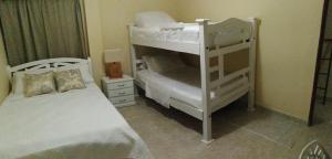 Postel nebo postele na pokoji v ubytování CASA PACHITA Getsemani