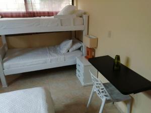 Postel nebo postele na pokoji v ubytování CASA PACHITA Getsemani
