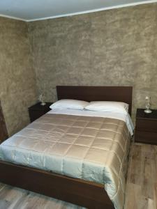 Postel nebo postele na pokoji v ubytování San Luigi - Rooms & Apartments