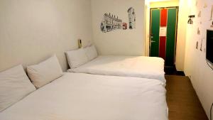 Fotografie z fotogalerie ubytování Happines Trip Inn v destinaci Tchaj-čung + 18 fotografií