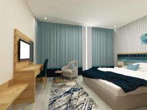 Ένα ή περισσότερα κρεβάτια σε δωμάτιο στο La Fontaine Diora Hotel