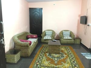Posezení v ubytování Coorg West End Home Stay