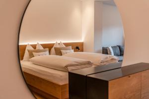 Krevet ili kreveti u jedinici u okviru objekta Spa&Aktiv Hotel Lavendel