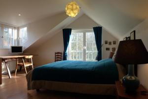 Postel nebo postele na pokoji v ubytování B&B Asbeek