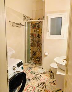 a bathroom with a shower and a toilet at Bring only your toothbrush! in Athens +19 photos