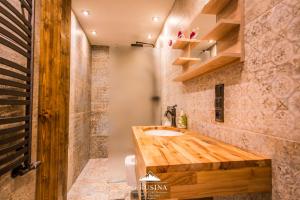 Kúpeľňa v ubytovaní Apartamenty u Rusina