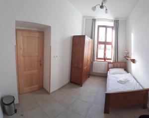 Postel nebo postele na pokoji v ubytování Penzion a restaurace U Hájků