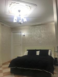 Llit o llits en una habitació de Super appartement de luxe T4 a la ville de Bejaia