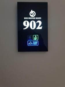 an image of the best recharge stations sign on a wall at Boss Boutique Athens in Athens