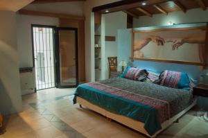 Ένα ή περισσότερα κρεβάτια σε δωμάτιο στο Casa Villa