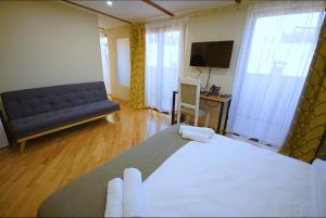 Postelja oz. postelje v sobi nastanitve Hotel Cordata