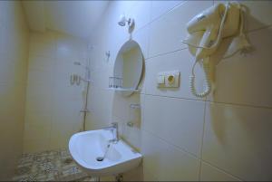 Kopalnica v nastanitvi Hotel Cordata