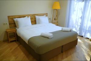 Postelja oz. postelje v sobi nastanitve Hotel Cordata