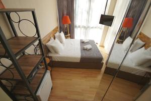 Postelja oz. postelje v sobi nastanitve Hotel Cordata