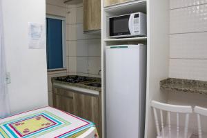 Kuchyň nebo kuchyňský kout v ubytování Residencial Neto