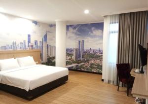 Postel nebo postele na pokoji v ubytování GiiA Sanno Hotel Pluit