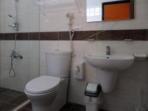 Koupelna v ubytování Ying Tian Ye Homestay + 28 fotografií