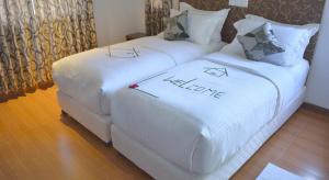 Letto o letti in una camera di Turquoise Residence by UI