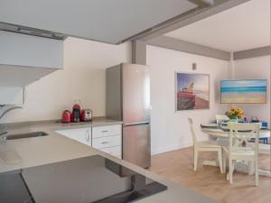 Kuchyňa alebo kuchynka v ubytovaní Malaga city apartment