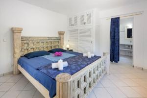 Un pat sau paturi într-o cameră la Villa Ca Daniela