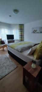 Łóżko lub łóżka w pokoju w obiekcie Gästehaus Probst