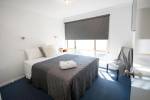 Ein Bett oder Betten in einem Zimmer der Unterkunft Archipelago Apartments Esperance