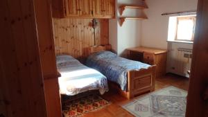 Voodi või voodid majutusasutuse casa vacanza Valle d Aosta toas