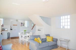 a living room with a couch and a table at The Old Chapel in Marlborough