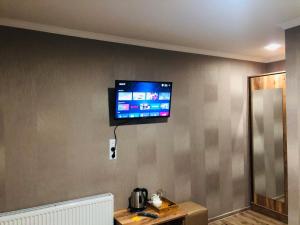 A television and/or entertainment centre at Paradise Kazbegi