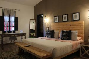 Postel nebo postele na pokoji v ubytování Hotel Real de Piedra