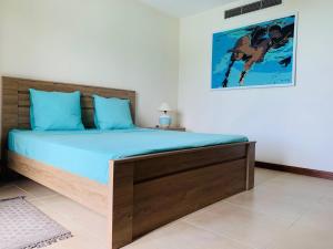 Ліжко або ліжка в номері appartement Grand Baie île Maurice