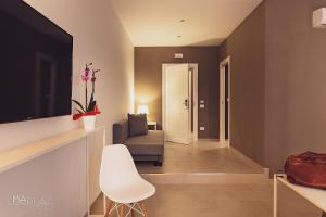 Televízia a/alebo spoločenská miestnosť v ubytovaní Marla's boutique rooms