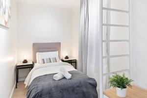 Posteľ alebo postele v izbe v ubytovaní Tendency Apartments Forum 4