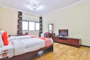 TV a/nebo společenská místnost v ubytování Grand PJ Hotel + 31 fotografií