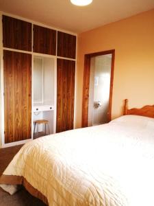 Letto o letti in una camera di Danubio Guest Accommodation