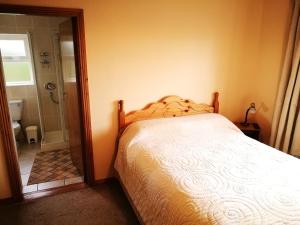 Letto o letti in una camera di Danubio Guest Accommodation
