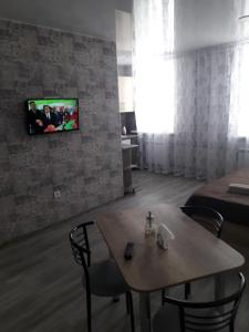 TV a/nebo společenská místnost v ubytování Studio on Stefan 37