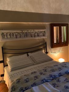 Postel nebo postele na pokoji v ubytování Casa le valli + 34 fotografií