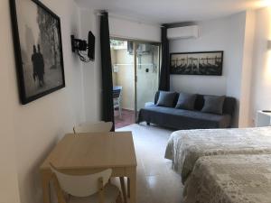 Posteľ alebo postele v izbe v ubytovaní Estudio Luxury Primera Linea de Playa Almuñecar Parking Gratuito