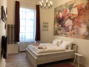 Posteľ alebo postele v izbe v ubytovaní All In Apartman IV.