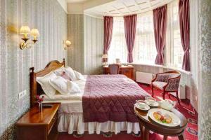Postel nebo postele na pokoji v ubytování Hotel Atlas Deluxe