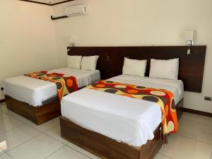 Postel nebo postele na pokoji v ubytování Hotel Manuel Antonio Park + 37 fotografií