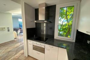 Dapur atau dapur kecil di Exklusive Mini-Villa mit viel Platz