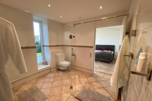 Koupelna v ubytování Exklusive Mini-Villa mit viel Platz + 25 fotografií