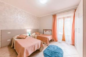 Postel nebo postele na pokoji v ubytování Happy House