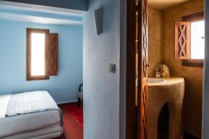 Llit o llits en una habitació de Dar Nour