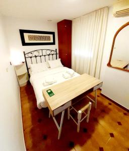 Posteľ alebo postele v izbe v ubytovaní Hostal Kokkola